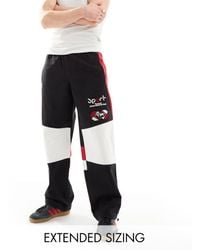 ASOS - Pantaloni joggers stile motocross a fondo ampio neri - Lyst