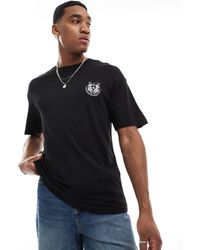 Jack & Jones - T-shirt oversize nera con stampa di tigre sul retro - Lyst