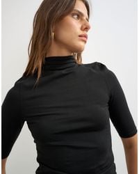 TOPSHOP - Jersey-top mit hohem kragen und halbarm - Lyst