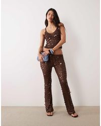 Missy Empire - Open Knit Disc Sequin Flare Beach Trousers Co-Ord - Lyst