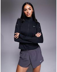 Nike - Swift Dri-fit Fitted Full Zip Top - Lyst