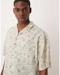 ASOS - Chemise coupe carrée oversize aspect lin à fleurs avec col à revers - crème - Lyst