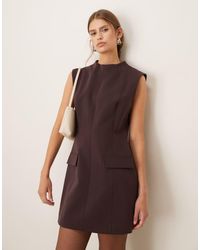 Mango - Hoogsluitende Elegante Mini-Jurk Zonder Mouwen Met Structuur - Lyst