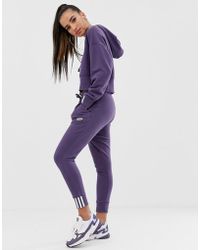adidas Originals Ryv Cuffed jogger In Purple