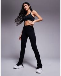 The Couture Club - Sculpting Stretch Emblem leggings - Lyst
