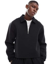 ASOS - Sudadera Negra De Corte Cuadrado Extragrande Con Cremallera Corta Y Cuello Tipo Polo De Tejido Efecto Neopreno De - Lyst