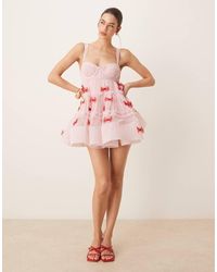 LACE & BEADS - Mini Babydoll-Jurk Met Strikapplicaties - Lyst