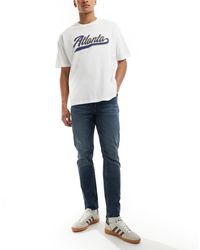ASOS - Vaqueros De Corte Slim Con Lavado Azul Oscuro Tintado Vintage De - Lyst