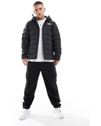 The North Face - Chaqueta Negra Acolchada Con Capucha Y Bolsillos Aconcagua 3 De -Negro - Lyst