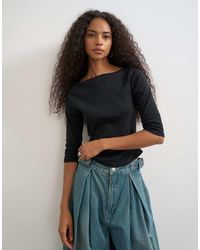 TOPSHOP - Slash Neck Curve Hem Top - Lyst
