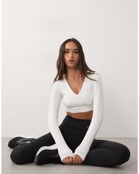4505 - Seamless Baby Rib Wrap Front Long Sleeve Top - Lyst