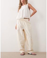 Mango - Tie Waist Barrel Leg Trouser With Embroidery Detail - Lyst