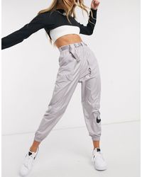 Pantalones cargo Nike de mujer desde 50 €