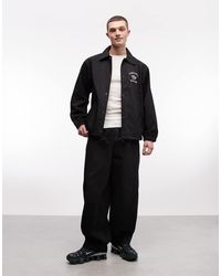 Carhartt - Chaqueta Negra Estilo Entrenador Con Logo Eightynine De - Lyst