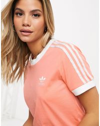 adidas originals adicolor three stripe stirrup jumpsuit in black