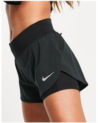 Nike - – eclipse – e 2-in-1 shorts - Lyst