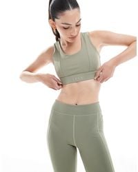BORN LIVING YOGA - Namir - soutien-gorge sport à rembourrage amovible - camouflage - Lyst