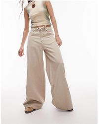 TOPSHOP - Jeans a fondo ampio color sabbia a vita bassa con coulisse - Lyst