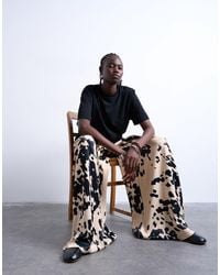 TOPSHOP - – hose aus satin mit weitem bein und kuhfellmuster - Lyst