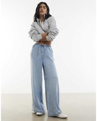 River Island - Denim Tie Waist Wide Leg Jeans - Lyst