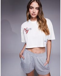 4505 - T-shirt crop top en coton à séchage rapide à imprimé au dos - vintage - Lyst