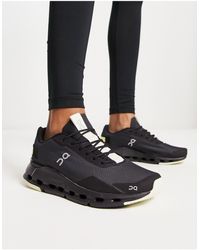 On Shoes - On - cloudnova - sneakers nere e gialle - Lyst