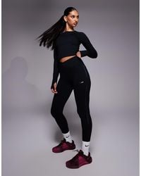 Nike - One Dri-fit Wrap Waist leggings - Lyst