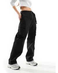 The North Face - Tonegawa - pantaloni cargo ampi neri con cintura - Lyst