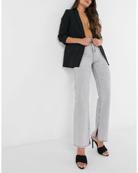 Stradivarius – Jeans mit geradem Bein im Stil der 90er mit geschlitztem Saum - Grau