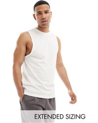 ASOS 4505 - Camiseta deportiva blanca sin mangas con sisas caídas - Lyst