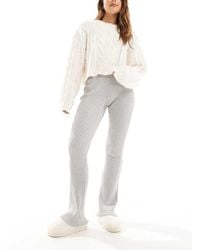 agon® - Flared Knit Trousers - Lyst