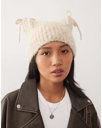 Collusion - Bonnet en maille duveteuse avec oreilles et nœuds - taupe - Lyst
