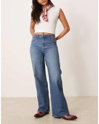 Wrangler - Vaqueros De Corte Recto Suelto Con Lavado Azul Medio De - Lyst