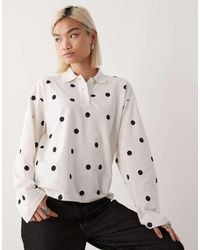 Monki - Polo Oversize Stile Rugby A Maniche Lunghe A Pois Bianca E Nera - Lyst