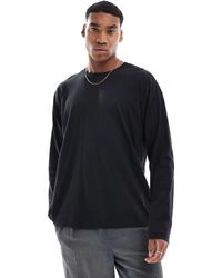 New Look - T-Shirt Oversize A Maniche Lunghe Nera - Lyst