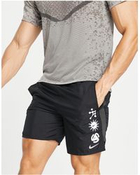 Nike Challenger 7 Inch Shorts in Purple 