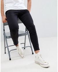 Vaqueros slim Pull\u0026Bear de hombre desde 16 €