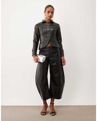 Lioness - Horseshoe Faux Leather Cropped Barrel Leg Trousers Co-ord - Lyst