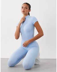 BO+TEE - Bo+tee Quarter Zip Short Sleeve Sports Top - Lyst