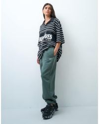Nike - Studio Fleece Mid-weight High Rise Oversized Cuffed jogger - Lyst