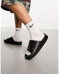 Nike - Sandalias negras calm - Lyst