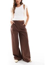 ASOS - Pantalon ample en flanelle - chocolat - Lyst
