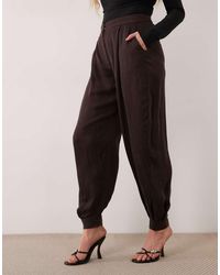 Mango - Pantaloni Con Risvolto Marroni - Lyst