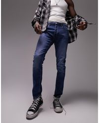Jean skinny stretch délavé Jean TOPMAN pour homme en coloris Noir Homme Vêtements Jeans Jeans skinny 