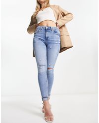 River Island - High Waisted Ripped Skinny Jean - Lyst