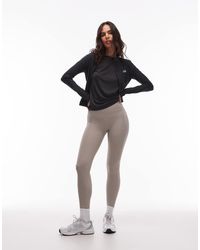 New Balance - Leggings De 27" Color Piedra De Talle Alto De Canalé De -Neutro - Lyst