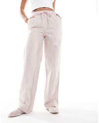 Superdry - – elastische hose aus baumwolle mit streifen - Lyst