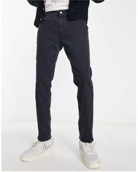 Hollister - Jeans slim anni '90 con strappi sulle ginocchia nero slavato - Lyst