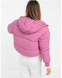 monki amber recycled short padded jacket with hood in blue