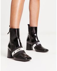 Love Moschino - Logo Detail Heeled Boots - Lyst